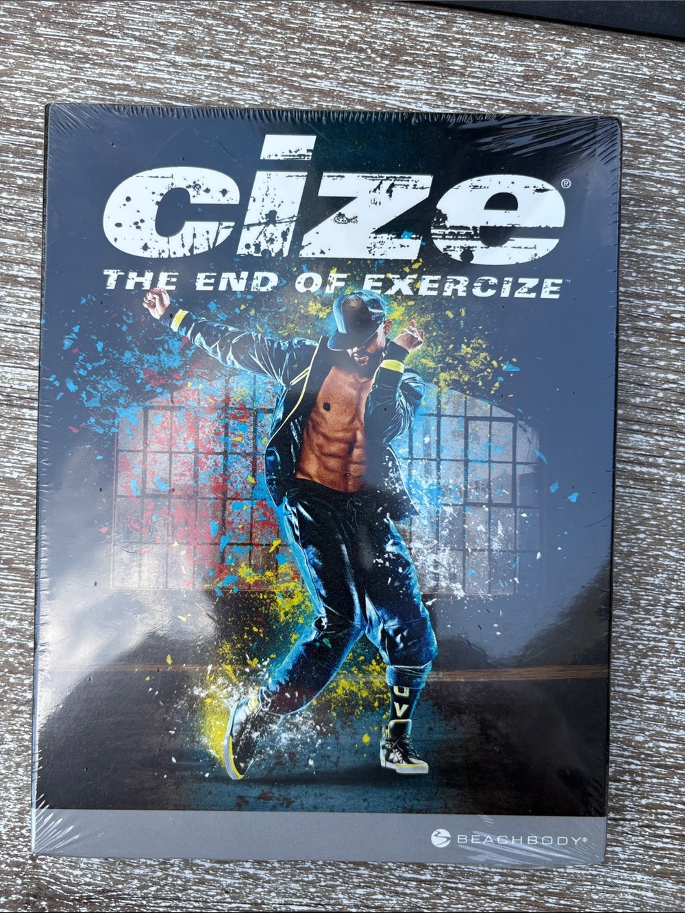 Beachbody Cize Dance Workout DVD Cover – Black, Blue, Yellow